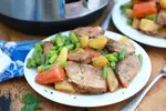 Pressure Cooker Pork Roast is packed with flavors of garlic, soy sauce, and onions as well as bay leaves and chicken stock. Tender and delicious in less than an hour. 