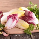 What is Endive? Learn about this crisp, slightly bitter leafy green, how to prepare it, and how it's used in traditional German dishes for a flavorful touch!