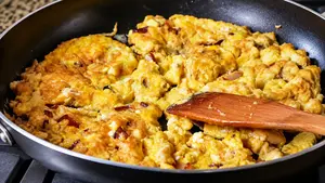 This Cheese Omelette recipe is a tasty treat for breakfast, brunch, and even supper. Adding mushrooms, potatoes, and bacon makes this one a real meal!