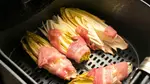 Oma’s bacon-wrapped endive with creamy mustard dip. My easy German twist for your next appetizer plate.