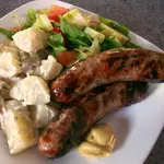 Discover the easy and delicious way how to cook sausage on a grill. Learn Oma's secret method for making the best German bratwurst ever, with wunderbar flavors you'll love!