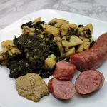 Make this kale and potato recipe on your stovetop, sort of like a stew, that includes smoked sausage. A one pot meal that's comfort food, just like Oma made.