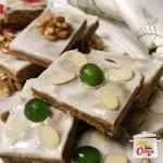 Oma’s Lebkuchen recipe is SO easy. Made in one bowl, baked, decorated, & cut. It’s authentic German gingerbread that smells like Christmas. The bars taste wunderBAR!