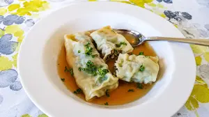 Maultaschen recipe: Discover traditional German pasta pockets from Swabia. Learn to make these meat-filled dumplings, their significance, and the legend behind them.