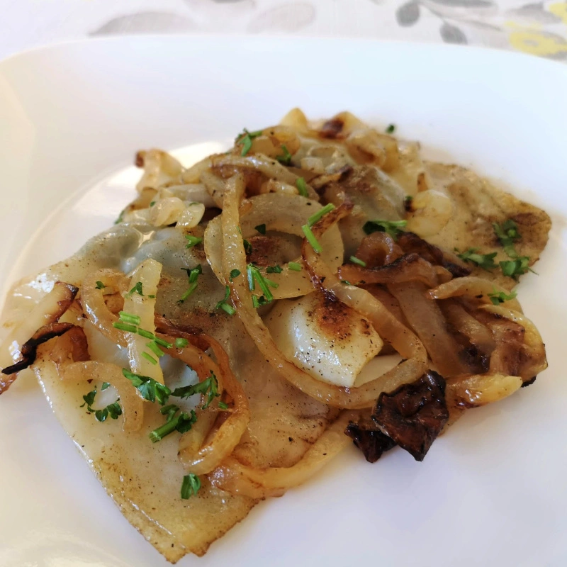 flat Maultaschen with onions flat Maultaschen with onions
