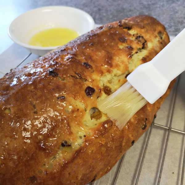 Brush warm stollen with melted butter. Mmm, doesn't that smell delicious! Brush warm stollen with melted butter. Mmm, doesn't that smell delicious!