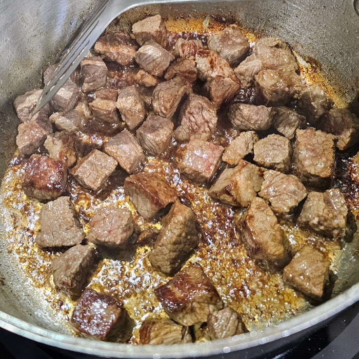Browning the beef for the German peppered beef stew Browning the beef for the German peppered beef stew