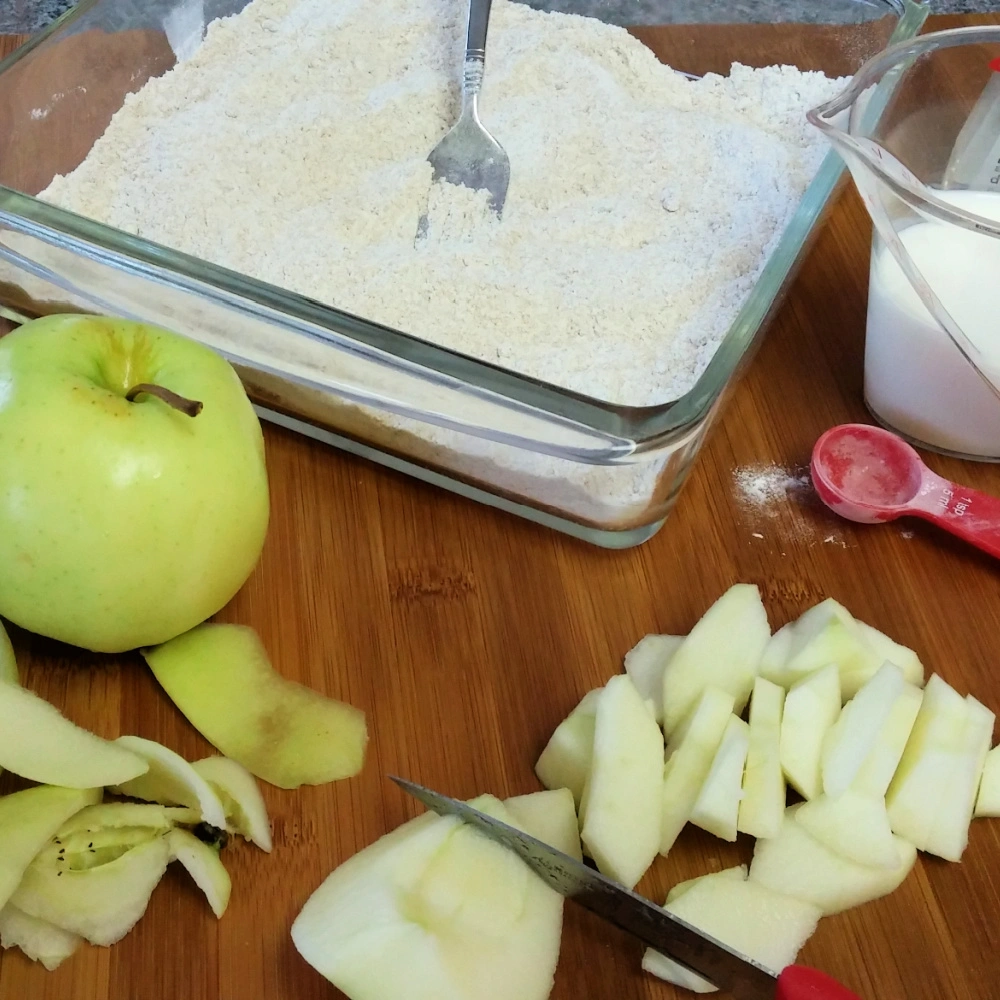 Cutting apples for German Apple Pudding cake