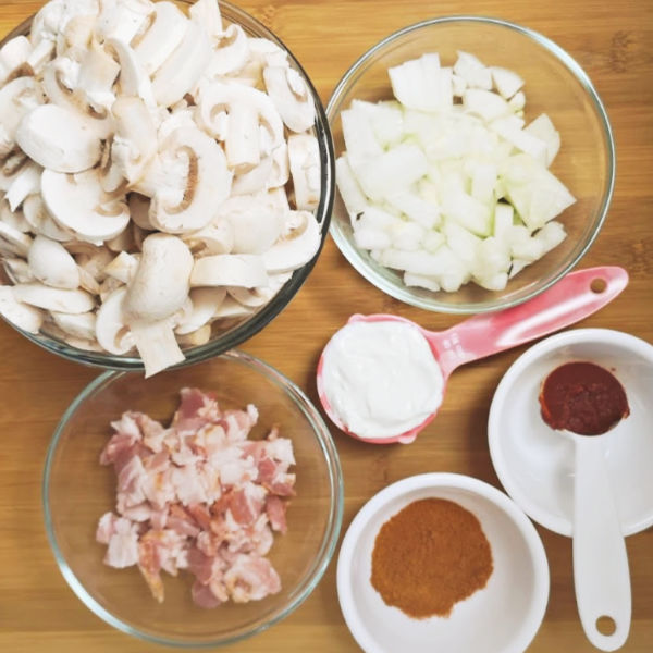Oma's Schnitzel ingredients including bacon and mushrooms give it delicious flavor