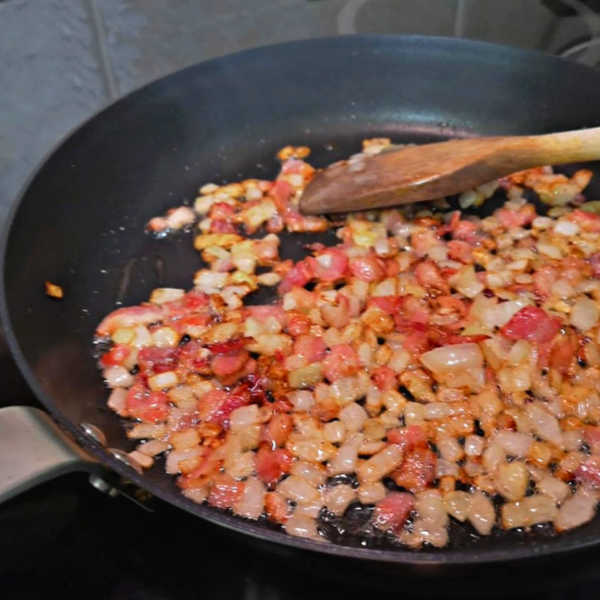 Frying ingredients to make jagerschnitzel! Try making this just like Oma!