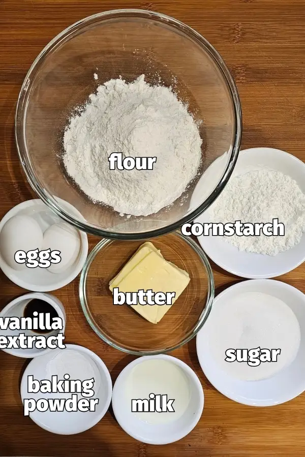 Ingredients for Amerikaner cookies: flour, cornstarch, eggs, butter, vanilla extract, sugar, baking powder and milk