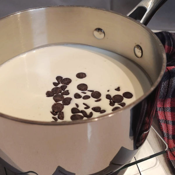Whipping cream and chocolate heating up