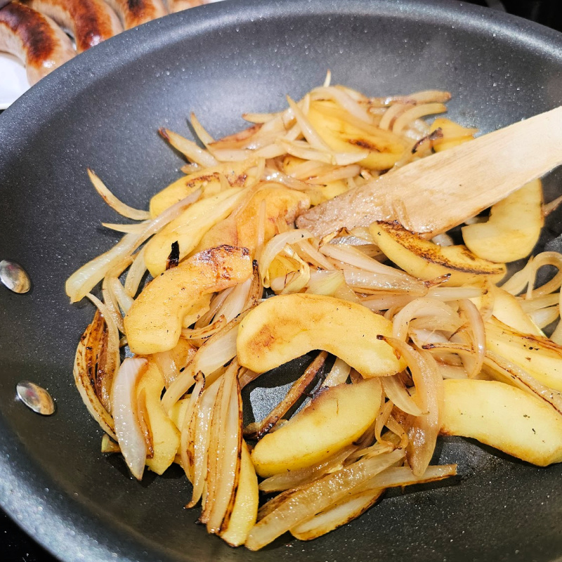 Sautéing onion and apple slices Sautéing onion and apple slices