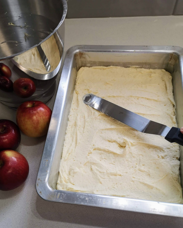 Spread batter in pan for streusel cake Spread batter in pan for streusel cake