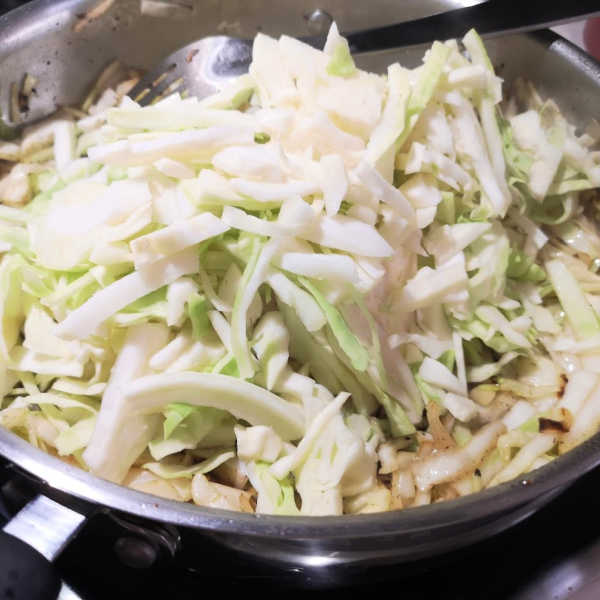 Add the rest of the cabbage and brown this a bit too, for this lazy cabbage roll recipe. Add the rest of the cabbage and brown this a bit too, for this lazy cabbage roll recipe.