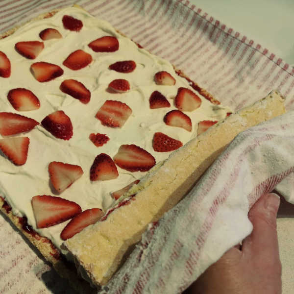 Rolling up the finished roll. Don't be afraid to get crafty with these when you make them, you can fill them with any fruit you desire!