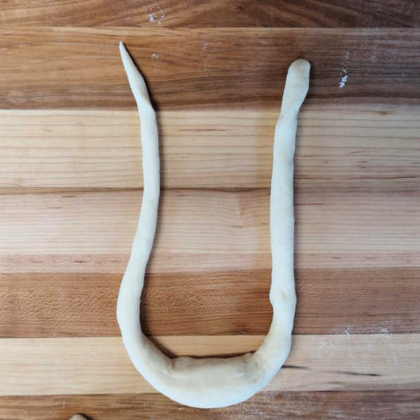 Form rope into a U shape Form rope into a U shape