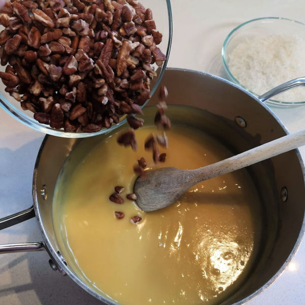 Adding pecans to custard filling