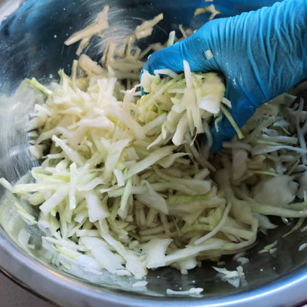 Massage cabbage to release its juices Massage cabbage to release its juices