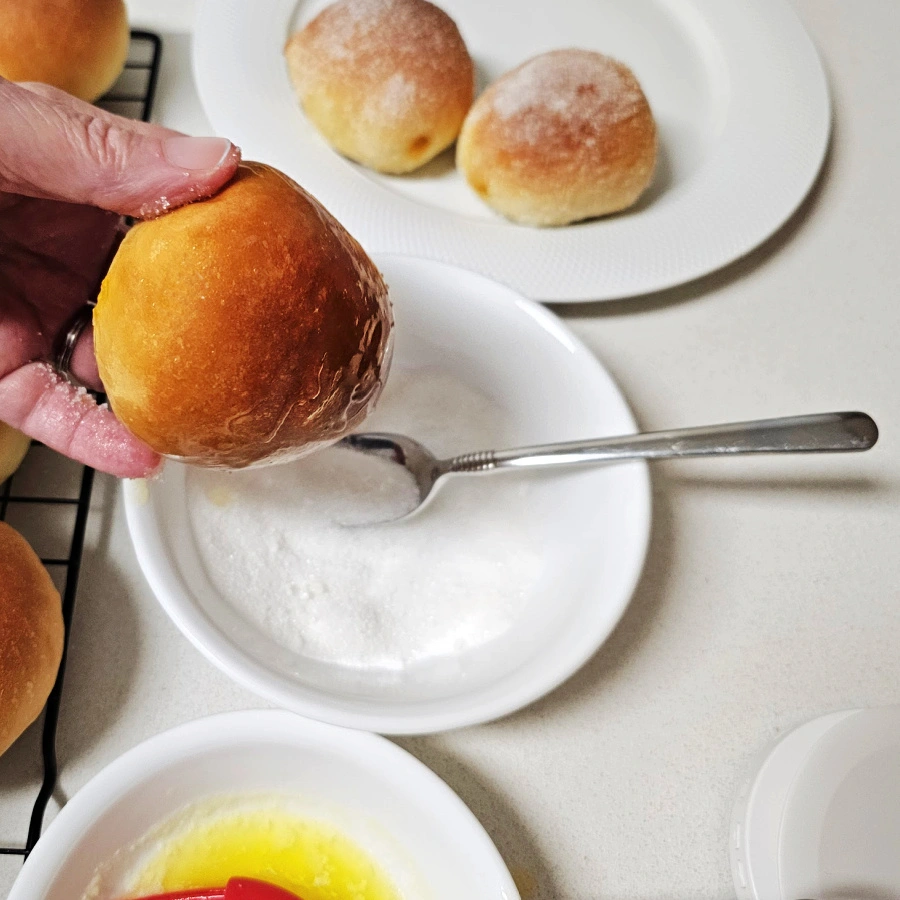 Brush the German donuts with butter