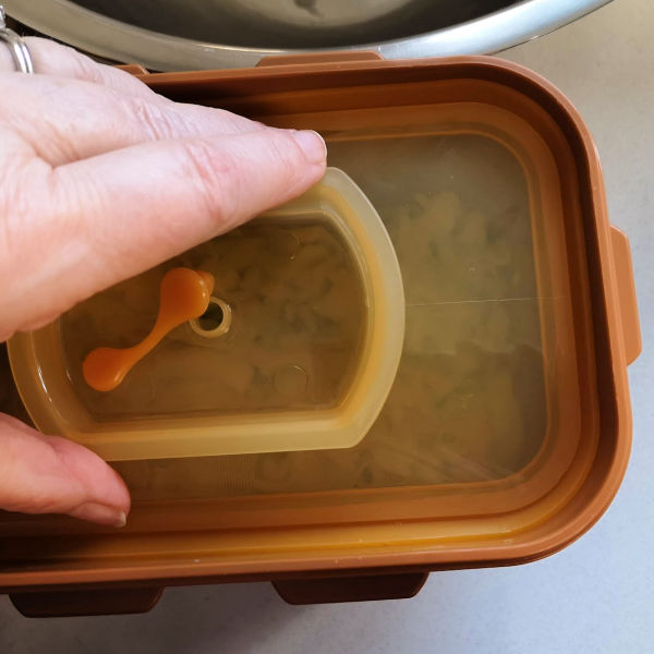 press down lid to get air tight fit with air lock open so air can escape press down lid to get air tight fit with air lock open so air can escape
