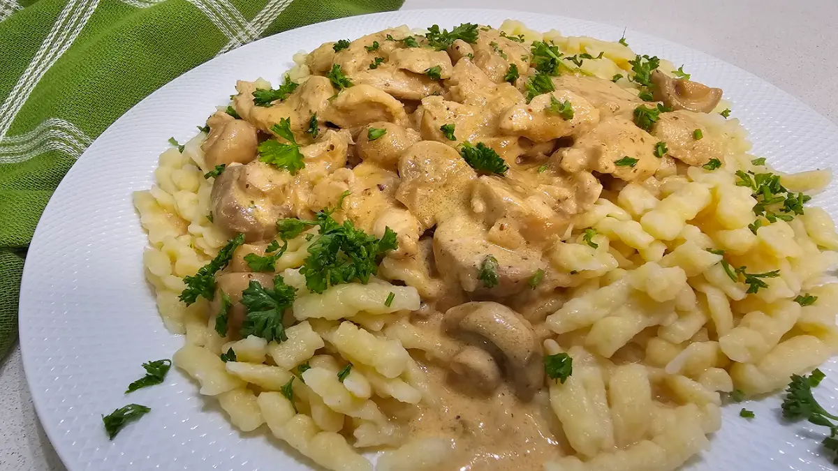 Creamy chicken stroganoff over spätzle, Oma’s German Hühnchen-Stroganoff made with heavy cream
