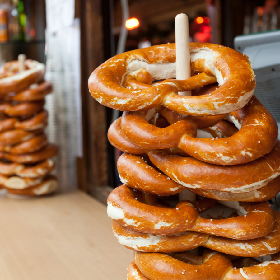 Enjoying Pretzels at the Christmas Market in München, Germany Enjoying Pretzels at the Christmas Market in München, Germany
