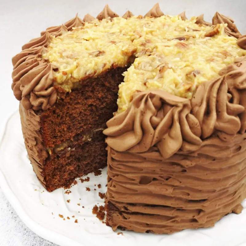 German-style German Chocolate Cake with Coconut Pecan Filling and Chocolate Cream Mousse Frosting