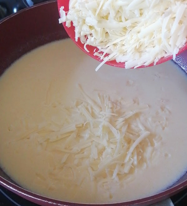 Melting in the yummy cheese medley to make the perfect cheesy sauce. The sauce is what makes or breaks the mac and cheese.