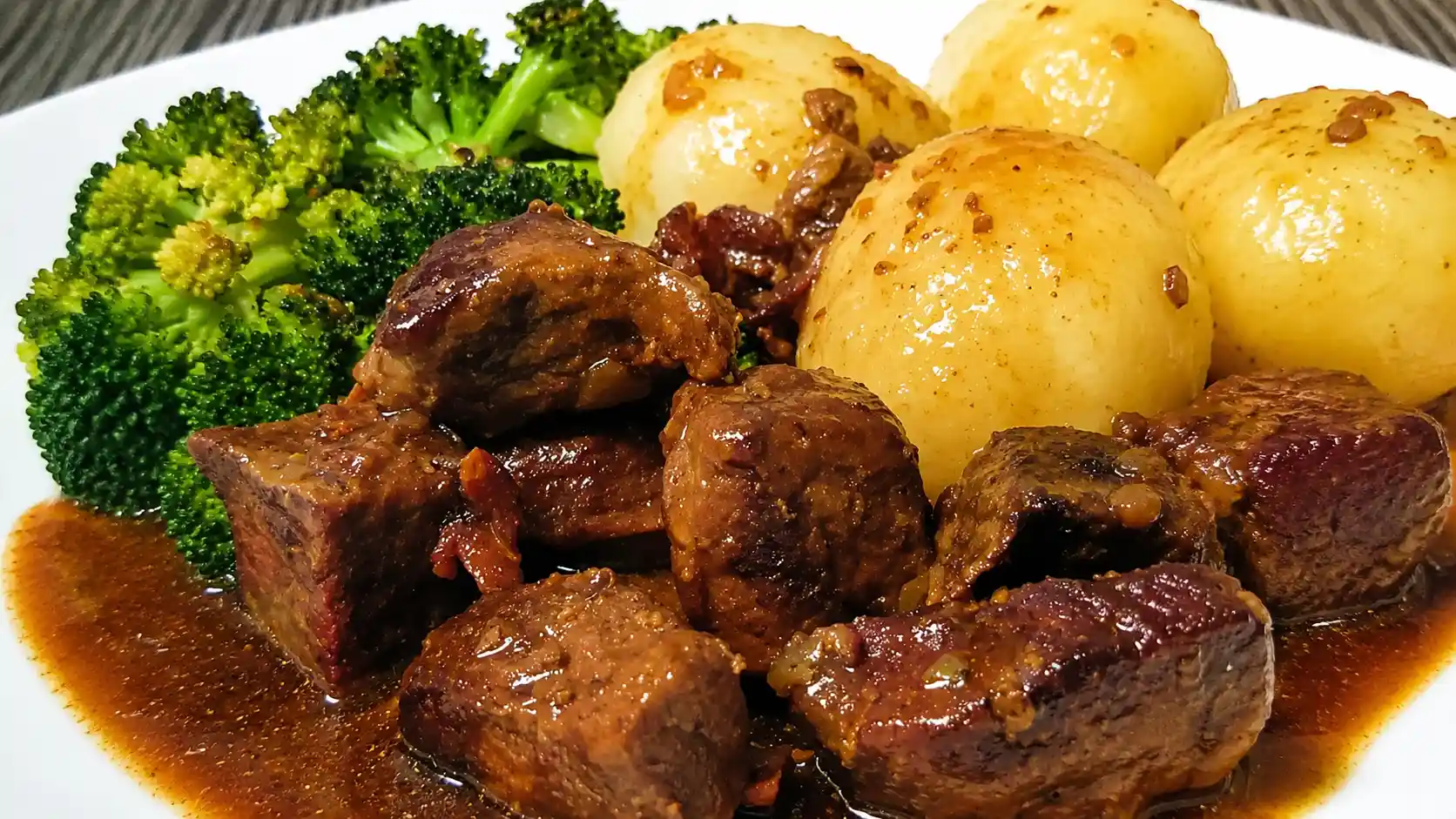 Beef Flatladen that taste just like rouladen, here served with potato dumplings and broccoli Beef Flatladen that tastes just like rouladen, here served with potato dumplings and broccoli