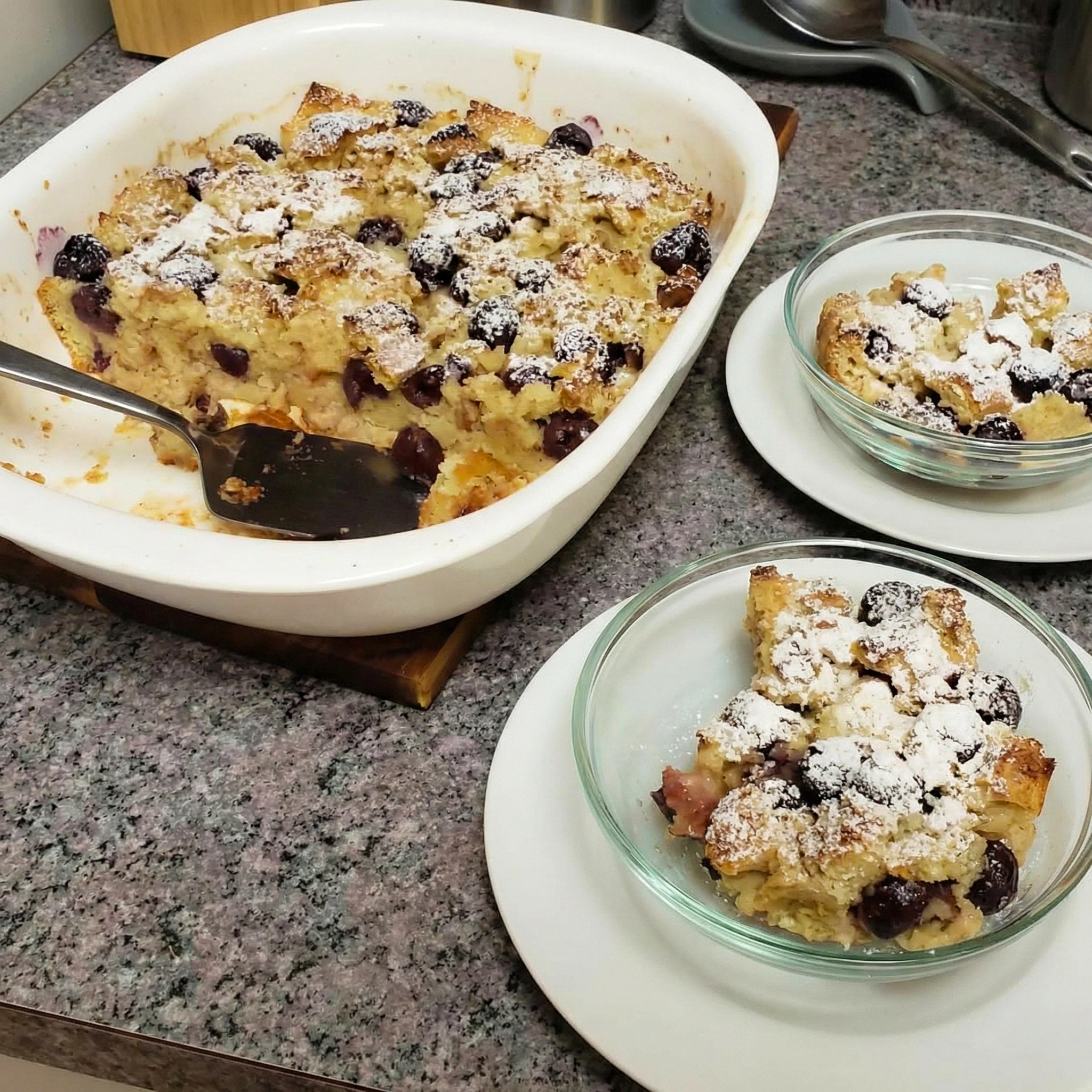 bowls of oma's delicious bread pudding with cherries