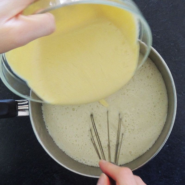 Whisking in that 'cheesy' vegan sauce - my secret ingredient in my creamy vegan cauliflower soup. Whisking in that 'cheesy' vegan sauce - my secret ingredient in my creamy vegan cauliflower soup.