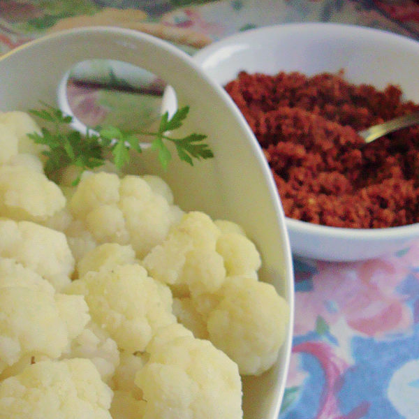Cauliflower ready to be covered in buttered breadcrumbs Cauliflower ready to be covered in buttered breadcrumbs