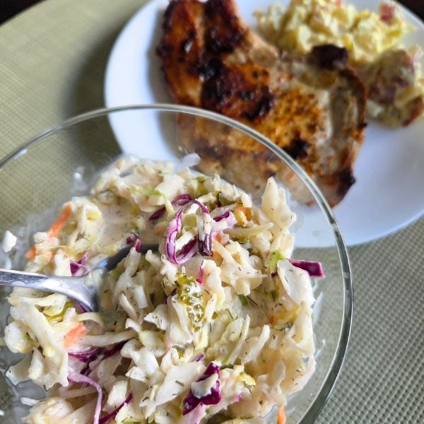 Pickle coleslaw served with German pork chops
