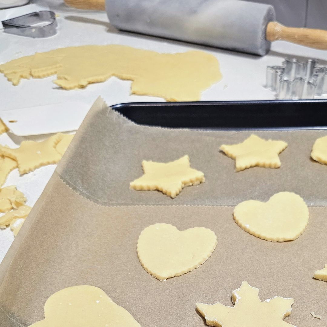 Cutting cookies into shapes with different cutters