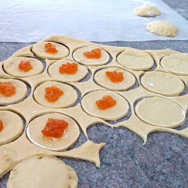 Making Berliner Pfannkuchen or Krapfen ~ German jelly donut filled with apricot jam Making Berliner Pfannkuchen or Krapfen ~ German jelly donut filled with apricot jam