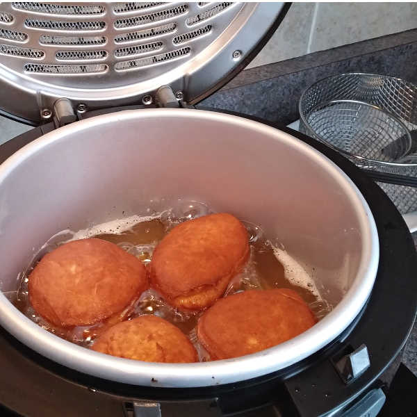 Deep Frying Berliner Pfannkuchen or Krapfen ~ German jelly donut that's so popular for New Year's. Deep Frying Berliner Pancake or Krapfen ~ German Jelly Donut