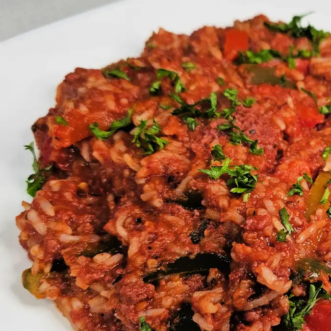 German Reisfleisch with rice, meat, tomatoes, and peppers