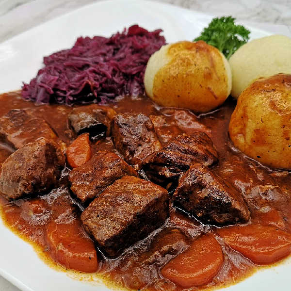 goulash, potato dumplings, red cabbage