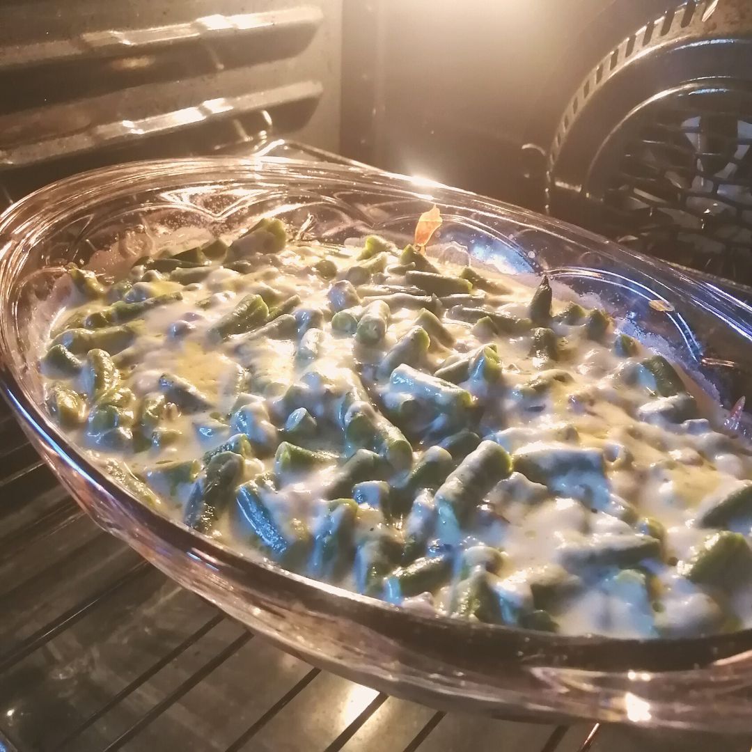 This cheesy green bean casserole recipe is a must have to add to your weeknight dinner menu. It's one of those easy side dish recipes that's really filling and can be made quickly cooking green bean casserole
