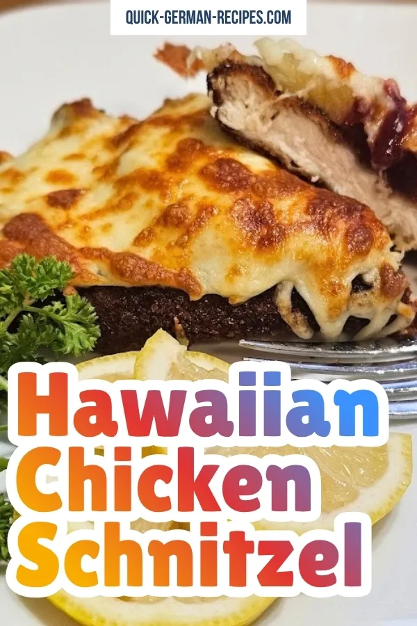 Hawaiian Chicken Schnitzel on a white plate with a sprig of parsley and text overlay