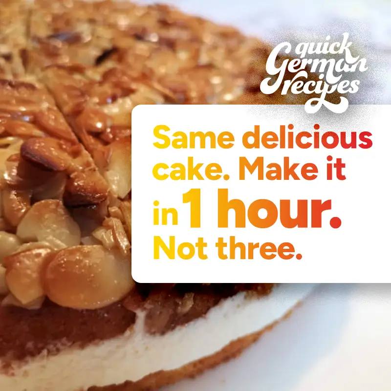 Close-up of a slice of Bienenstich cake with creamy filling and almond topping.