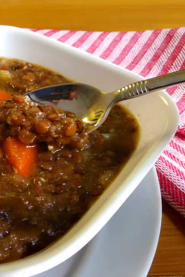Lentil soup in white bowl
