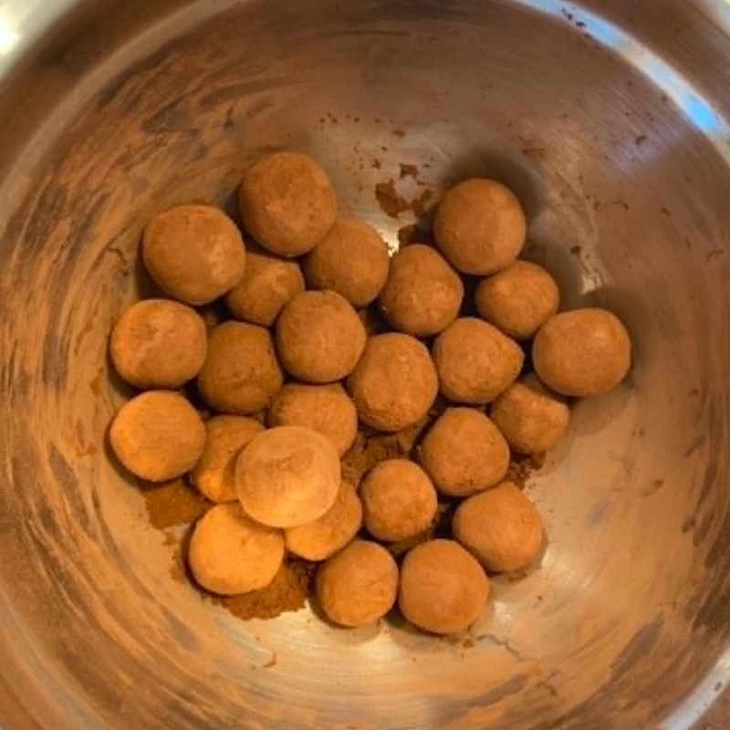 Shake the balls until covered with cocoa powder German Marzipan Potatoes Step 8