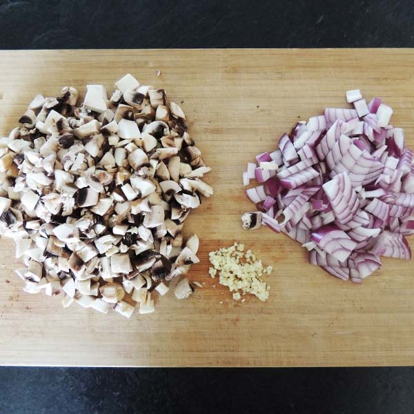 Prepping veggies for Sylvie's Creamy Vegan Mushroom Soup. Just like Oma's and packed full of nutritional goodness.