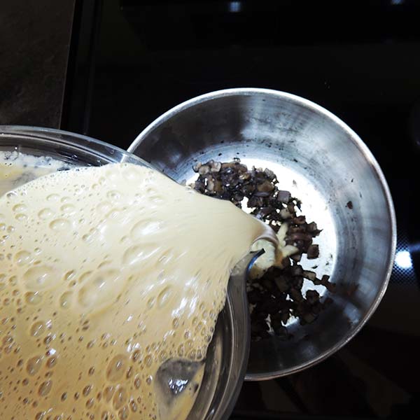 Pour the delicious contents of the blender back into the pot with the rest of the mushrooms.