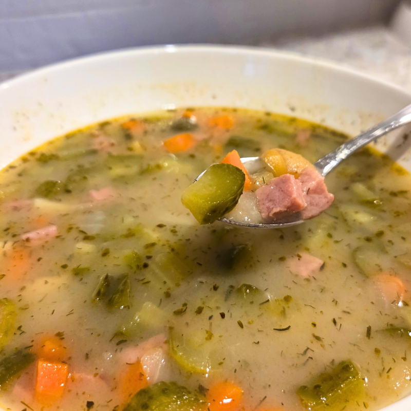 closeup spoonful of pickle soup