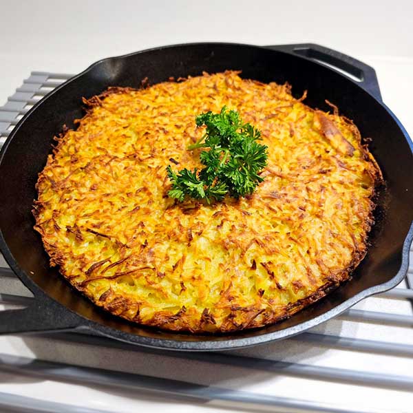 Potato Pancake in cast iron pan Potato Pancake in cast iron pan
