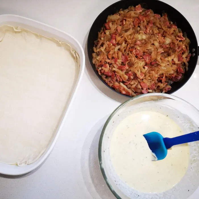 Putting the Zwiebelkuchen together Putting the Zwiebelkuchen together