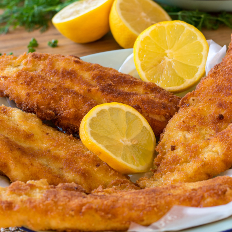 fried fish with lemon slices